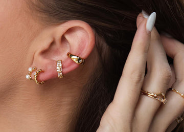 Be daring by going for an ear stack and using ear cuffs.