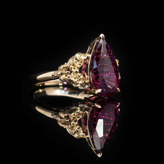 Roswyn in 14K Gold with Pear Umbalite Garnet